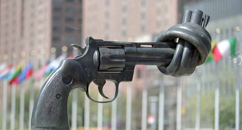 The sculpture "Non-Violence" by the noted Swedish sculptor Carl Fredrik Reuterswärd, is a gift of the Government of Luxembourg to the United Nations, and stands on a platform near the public entrance of the United Nations complex. The sculpture is a large replica of a .45 calibre revolver with a twisted barrel, to symbolize peace and non-violence.