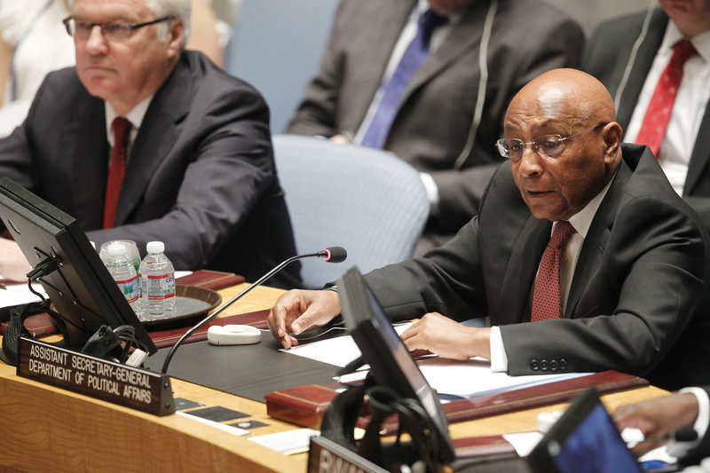 Tayé-Brook Zerihoun (right), Assistant Secretary-General for Political Affairs, briefs the Security Council on the situation in Ukraine. On his right is Vitaly I. Churkin, Permanent Representative of the Russian Federation to the UN and President of the Security Council for June.