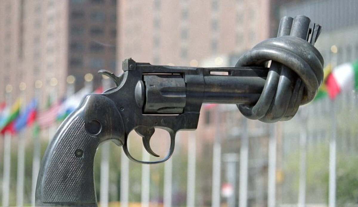 The sculpture "Non-Violence" by the noted Swedish sculptor Carl Fredrik Reuterswärd, is a gift of the Government of Luxembourg to the United Nations, and stands on a platform near the public entrance of the United Nations complex. The sculpture is a large replica of a .45 calibre revolver with a twisted barrel, to symbolize peace and non-violence.