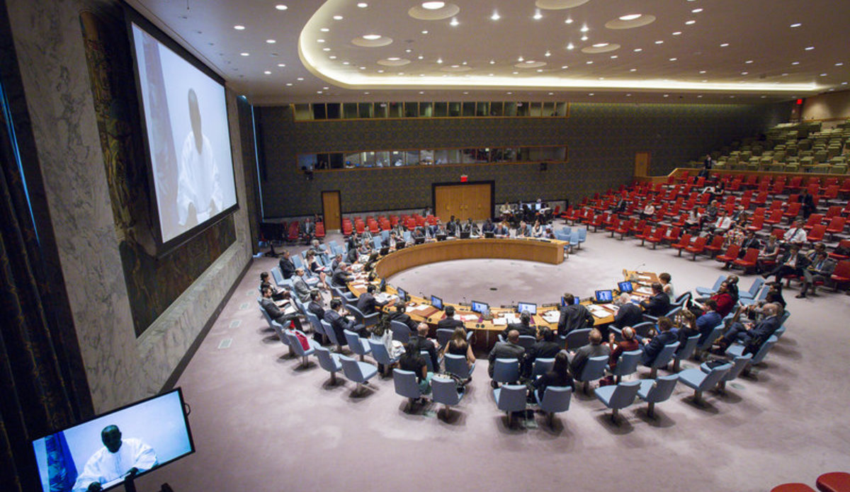 A wide view of the Security Council Chamber as Mohammed Ibn Chambas (shown on screens), Special Representative of the Secretary-General and Head of the UN Office for West Africa and the Sahel (UNOWAS), addresses via video teleconference the Security Council meeting on “Peace and security in Africa: Challenges in the Sahel region”.